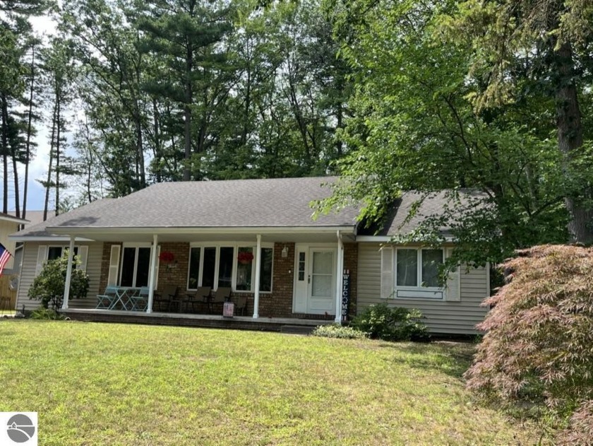 Nestled in a quiet neighborhood by the college and East Bay Park - Beach Home for sale in Traverse City, Michigan on Beachhouse.com