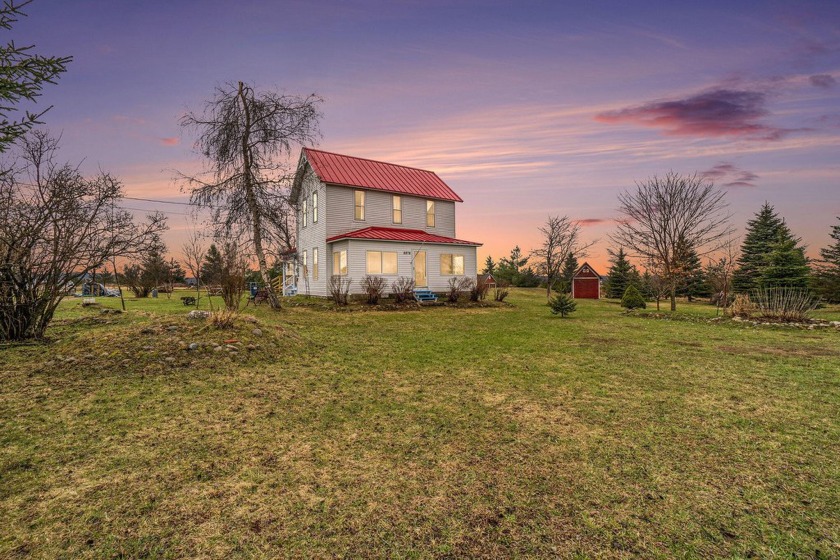 Nestled on approximately 3 acres of rural countryside, this - Beach Home for sale in Alanson, Michigan on Beachhouse.com