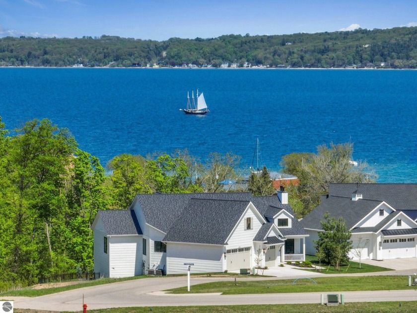 Welcome to this exquisite  custom-built home in the heart of - Beach Home for sale in Traverse City, Michigan on Beachhouse.com