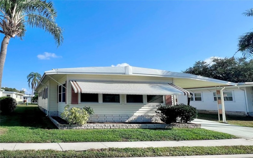 Charming, Well-Maintained Home in the Premier 55+ Community of - Beach Home for sale in Largo, Florida on Beachhouse.com