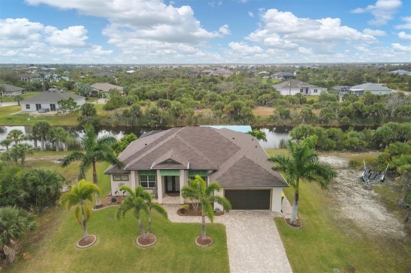 Enjoy Florida living in this elegant waterfront home! This 3 - Beach Home for sale in Port Charlotte, Florida on Beachhouse.com