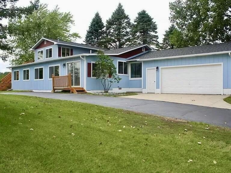 Nestled along the scenic fairways of Logger's Trace Golf Course - Beach Home for sale in Harrisville, Michigan on Beachhouse.com