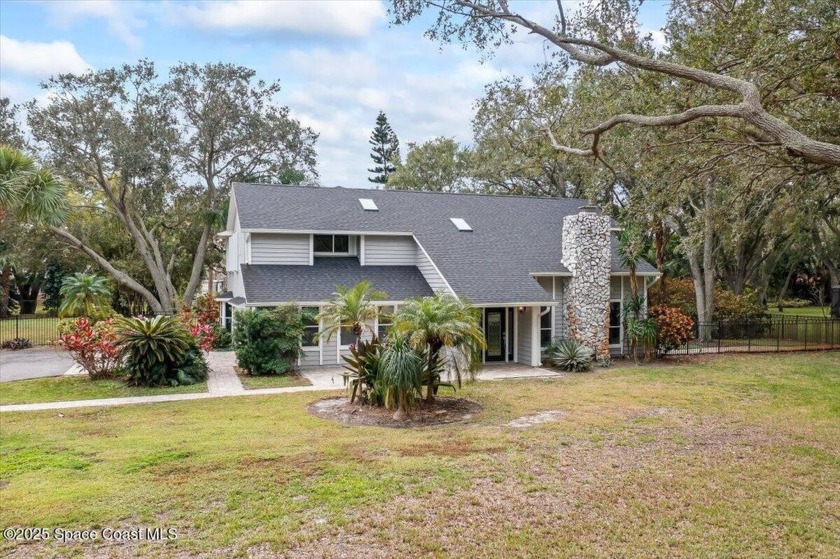 This 4-BB, 3.5-BA pool home on S. Merritt Island is nestled on a - Beach Home for sale in Merritt Island, Florida on Beachhouse.com