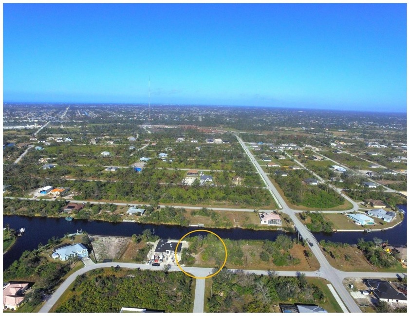 Enjoy roughly 80 feet of shoreline from this waterfront property - Beach Lot for sale in Port Charlotte, Florida on Beachhouse.com