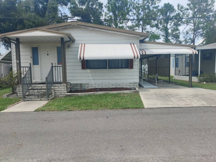 Spacious Double Wide Mobile Home with 2 bedrooms and 2 bathrooms - Beach Home for sale in Tampa, Florida on Beachhouse.com