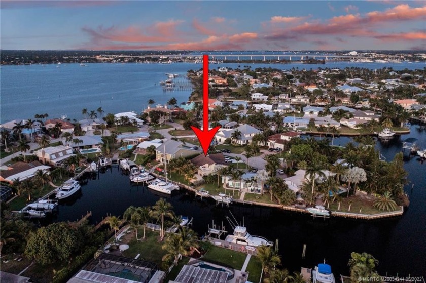 This incredible waterfront home is located in desirable Seagate - Beach Home for sale in Palm City, Florida on Beachhouse.com