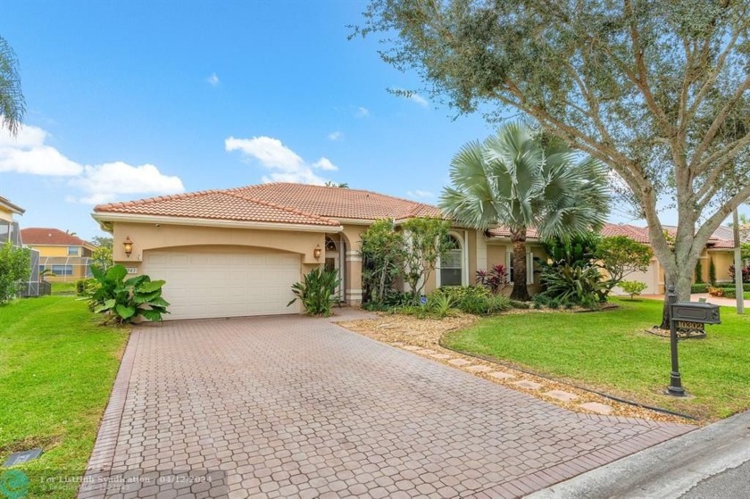 EXTRAORDINARY OPPORTUNITY TO OWN THIS 4 BDR 2 BA WATERFRONT POOL - Beach Home for sale in Coral Springs, Florida on Beachhouse.com