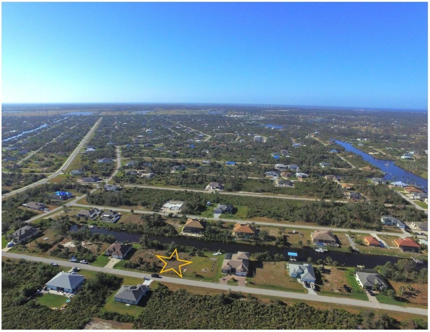 Enjoy roughly 80 feet of shoreline from this waterfront property - Beach Lot for sale in Port Charlotte, Florida on Beachhouse.com