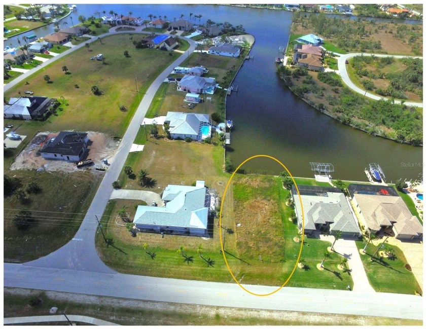 Waterfront Lot For Sale with a Concrete Seawall & Only One - Beach Lot for sale in Port Charlotte, Florida on Beachhouse.com