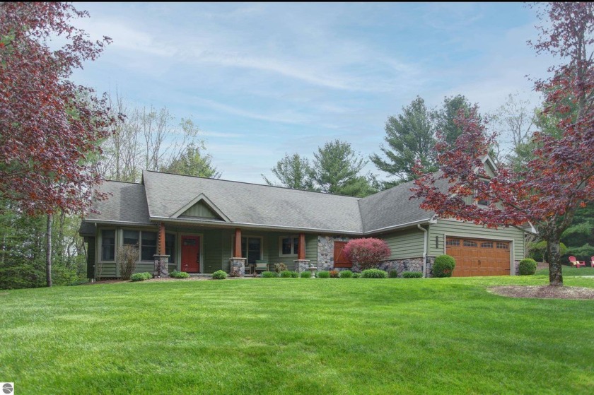 Tucked away in the woods near the Boardman River is a haven of - Beach Home for sale in Traverse City, Michigan on Beachhouse.com