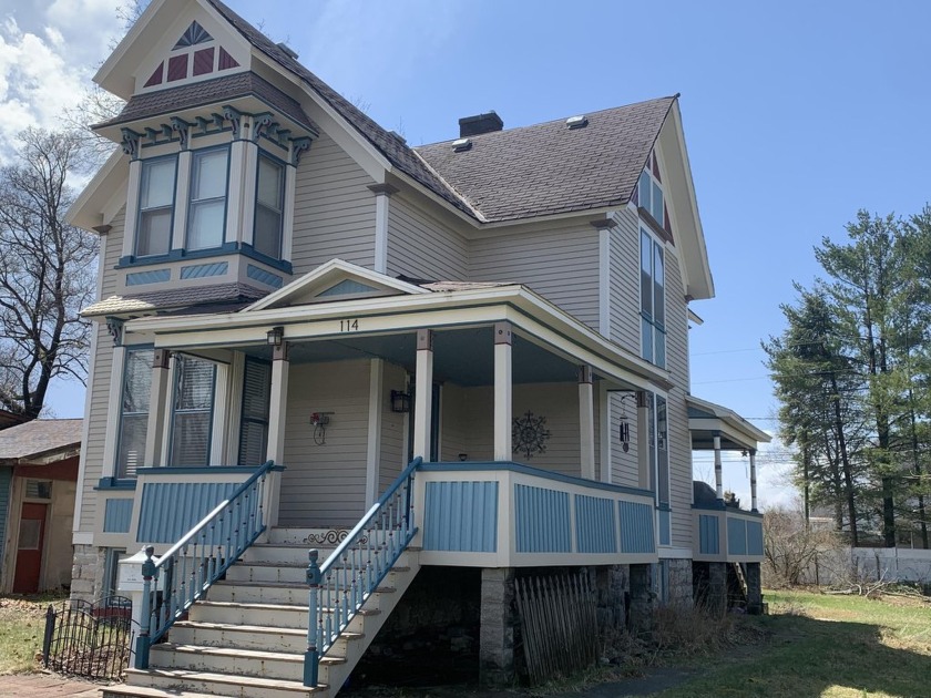 Here is a beautiful and grand ole Victorian lady with detailed - Beach Home for sale in Alpena, Michigan on Beachhouse.com