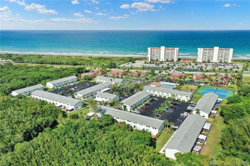 Directly across the street from the beach, this 2 bedroom 1.5 - Beach Condo for sale in Jensen Beach, Florida on Beachhouse.com