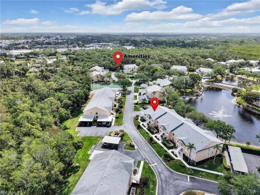 This fantastically priced, first-floor, lake-front, end-unit - Beach Home for sale in Naples, Florida on Beachhouse.com