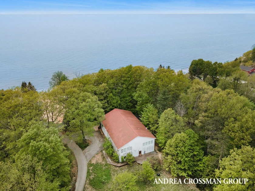 This expansive two-story building is nestled on 2+ picturesque - Beach Home for sale in Holland, Michigan on Beachhouse.com