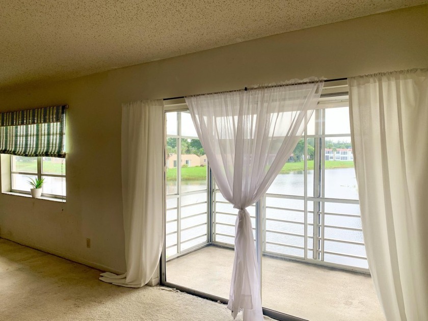 This Rare Charming Corner unit with Spectacular WATER VIEWS from - Beach Condo for sale in West Palm Beach, Florida on Beachhouse.com