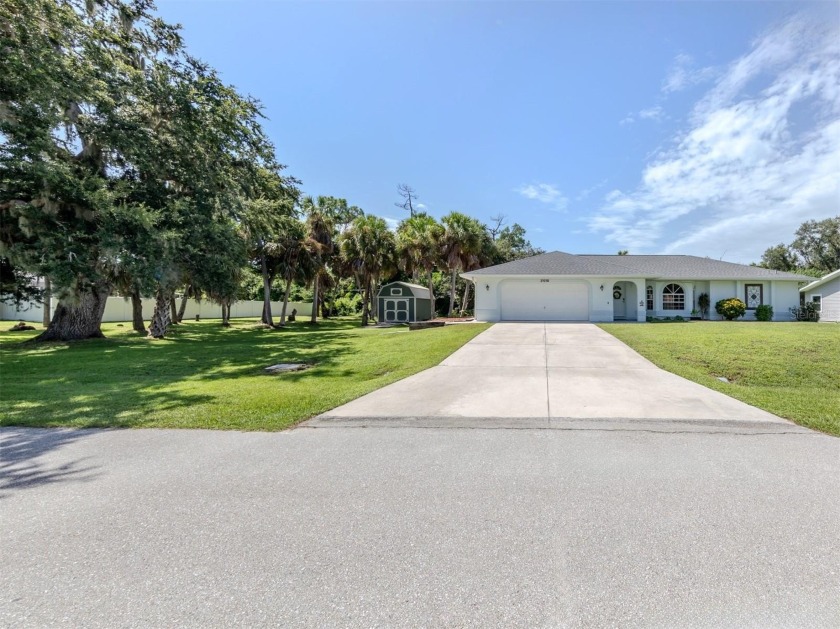 Charming 3-Bedroom, 2-Bath Home on Spacious Lot Located in X - Beach Home for sale in Port Charlotte, Florida on Beachhouse.com