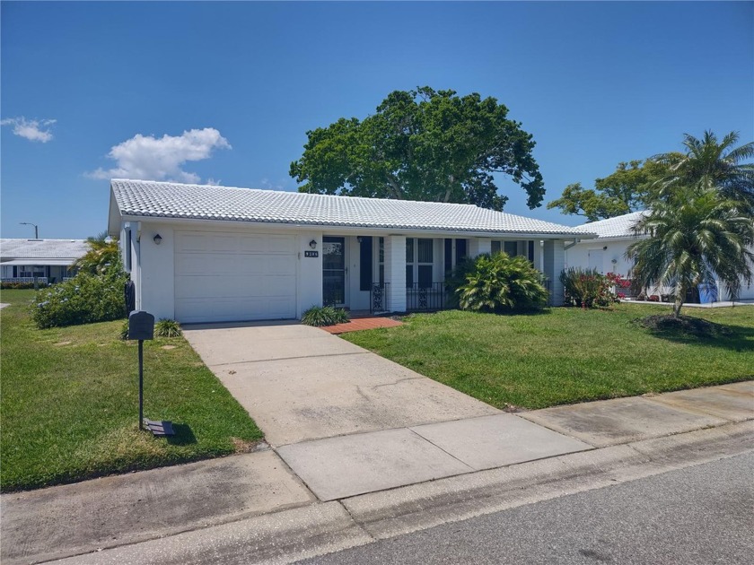 MOVE-IN READY, EBBTIDE floor plan!  This rare opportunity in the - Beach Home for sale in Pinellas Park, Florida on Beachhouse.com