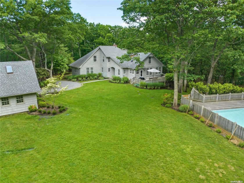 Arrive via a long private drive to this completely private - Beach Home for sale in Sag Harbor, New York on Beachhouse.com