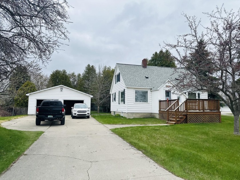 This charming home features large south-facing windows that - Beach Home for sale in Alpena, Michigan on Beachhouse.com