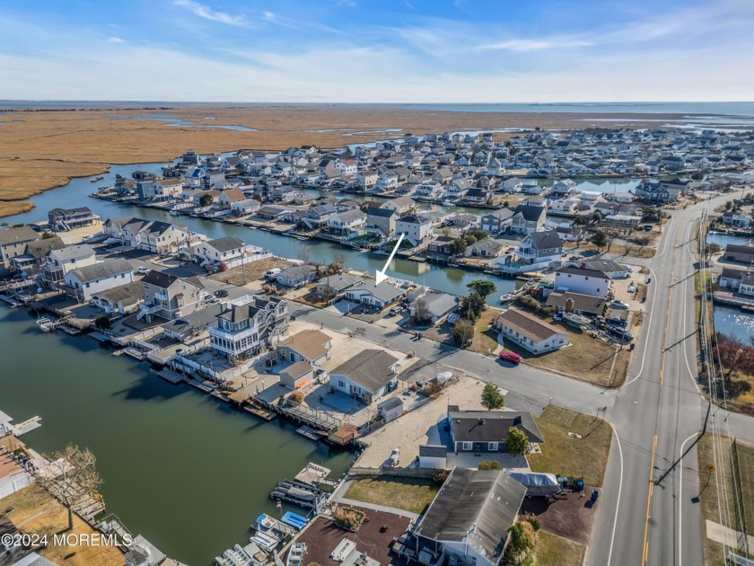 Situated on a wide, recently dredged lagoon, this updated - Beach Home for sale in Little Egg Harbor, New Jersey on Beachhouse.com