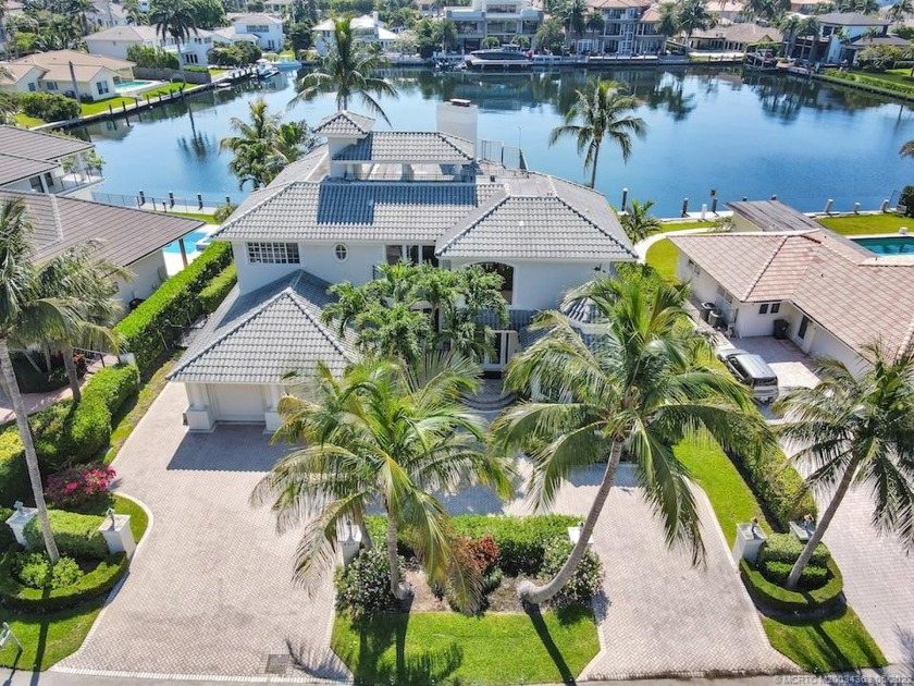 Discover this deep waterfront home in exclusive Bel Lido seaside - Beach Home for sale in Highland Beach, Florida on Beachhouse.com
