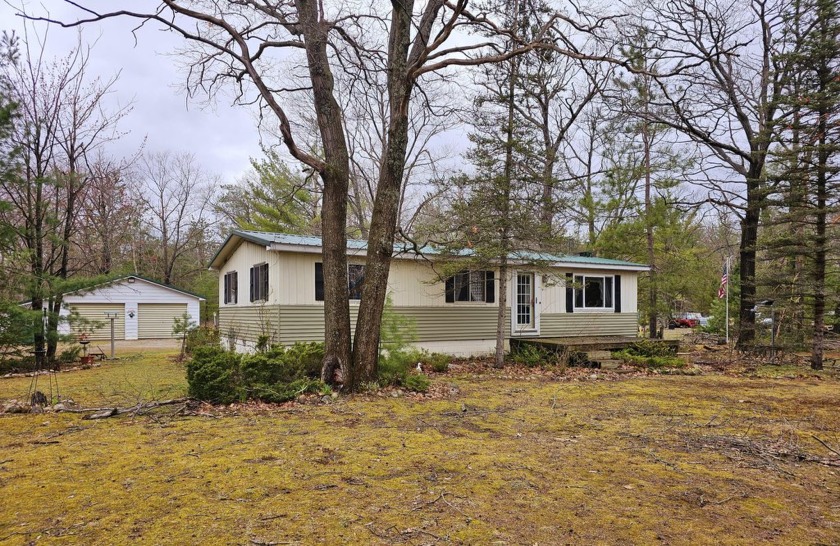 Located just minutes from Cheboygan, this quaint 3 bed, 1 bath - Beach Home for sale in Cheboygan, Michigan on Beachhouse.com