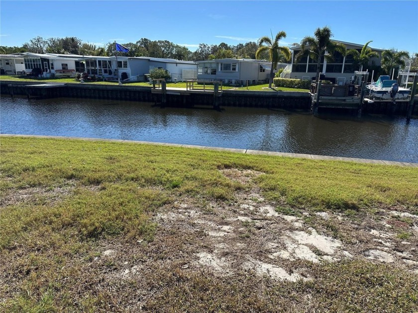 WATERFRONT LIVING can be yours with this 2 Bed/2 Bath home on a - Beach Home for sale in St. Petersburg, Florida on Beachhouse.com