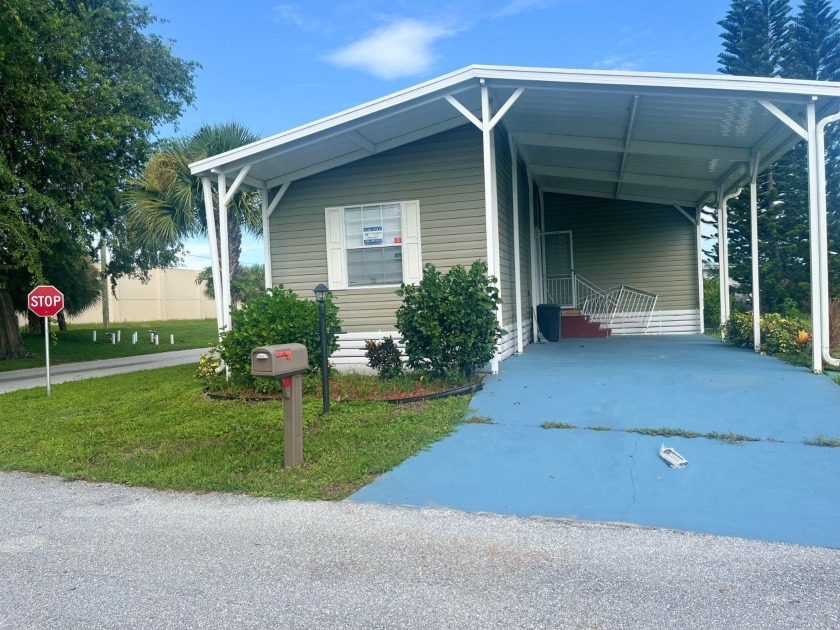 This is an open concept home with a large living room and dining - Beach Home for sale in Fort Pierce, Florida on Beachhouse.com