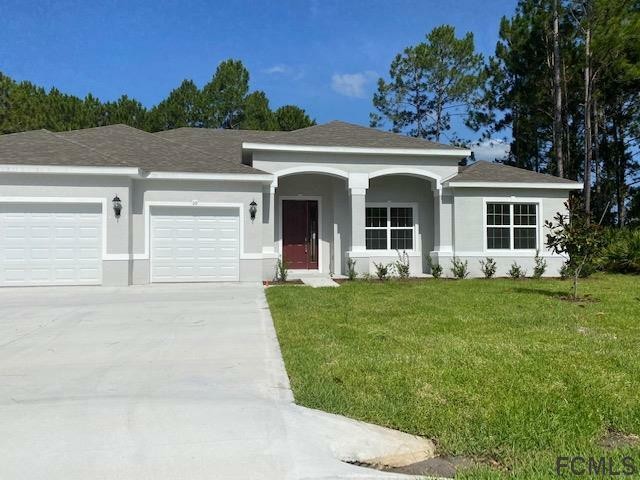 NEW CONSTRUCTION HOME -READY TO MOVE IN. BEAUTIFUL & ELEGANT - Beach Home for sale in Palm Coast, Florida on Beachhouse.com