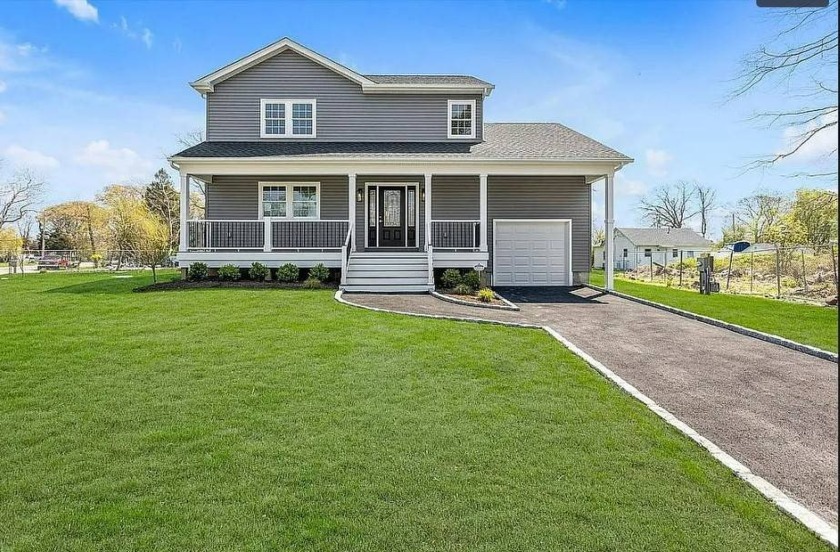 NEW CONSTRUCTION 2153 SQ. FT. 3 BEDROOM 3 BATH COLONIAL WITH A 1 - Beach Home for sale in Shirley, New York on Beachhouse.com