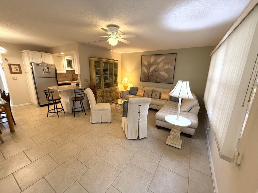 Imagine waking up to tranquil lake views and living just steps - Beach Condo for sale in Deerfield Beach, Florida on Beachhouse.com