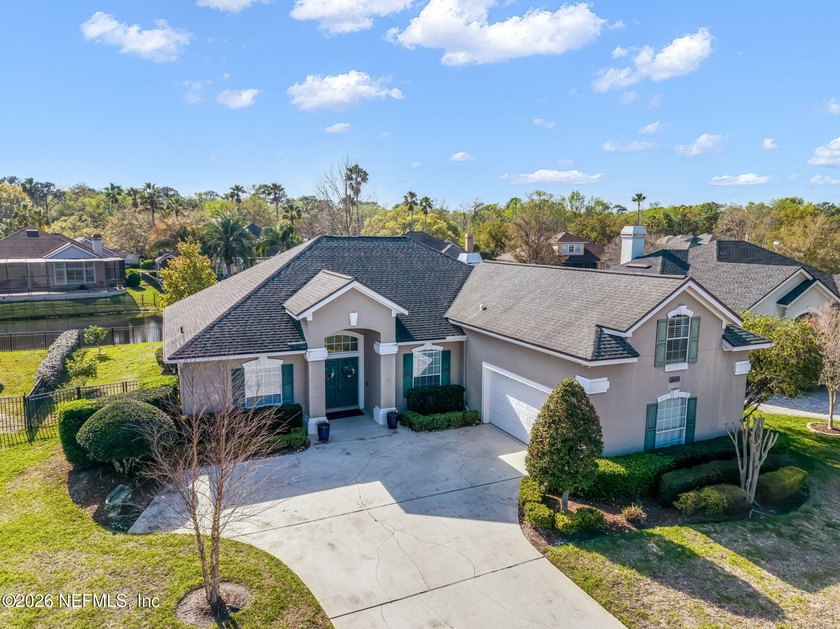 Tucked along a tranquil lagoon inside the prestigious - Beach Home for sale in Jacksonville, Florida on Beachhouse.com