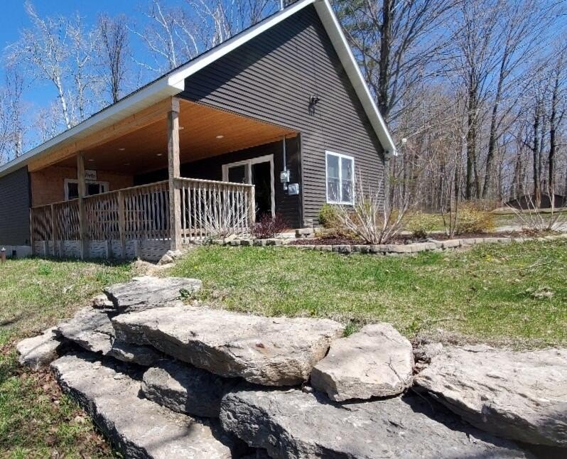 This beauty lets you enjoy year-round waterfront sports without - Beach Home for sale in Alpena, Michigan on Beachhouse.com