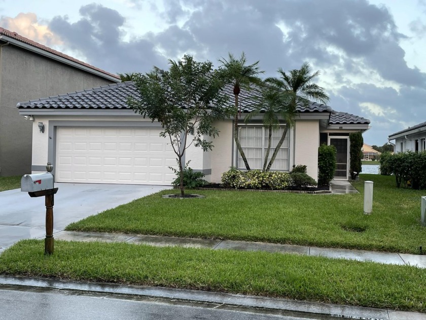 Charming Lakefront Family Home with Endless Potential. A - Beach Home for sale in Lake Worth, Florida on Beachhouse.com