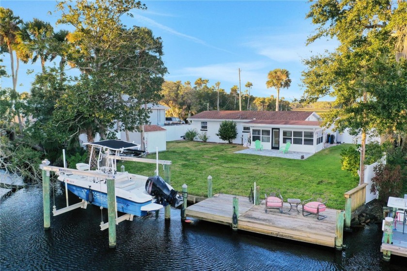 The Tomoka River awaits at this fully renovated waterfront - Beach Home for sale in Ormond Beach, Florida on Beachhouse.com