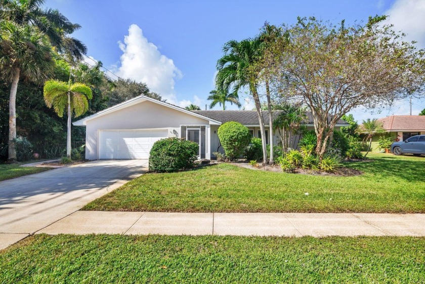 Juno Isles One Level Single Family Pool Home in very private - Beach Home for sale in North Palm Beach, Florida on Beachhouse.com