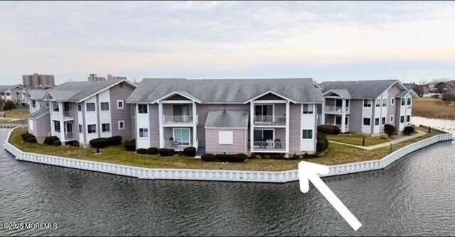 Step into relaxed shore living in this sunlit 1-bedroom, 1-bath - Beach Condo for sale in Monmouth Beach, New Jersey on Beachhouse.com