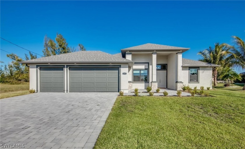 Stunning Waterfront Home in SW Cape Coral situated on oversized - Beach Home for sale in Cape Coral, Florida on Beachhouse.com
