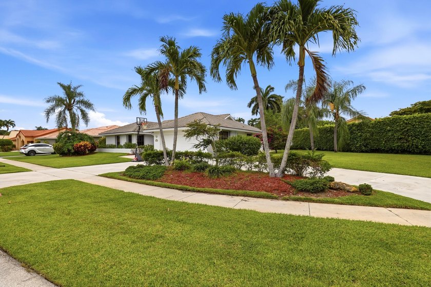 Rarely available in Estates of Silverlake! Situated on a private - Beach Home for sale in Boynton Beach, Florida on Beachhouse.com