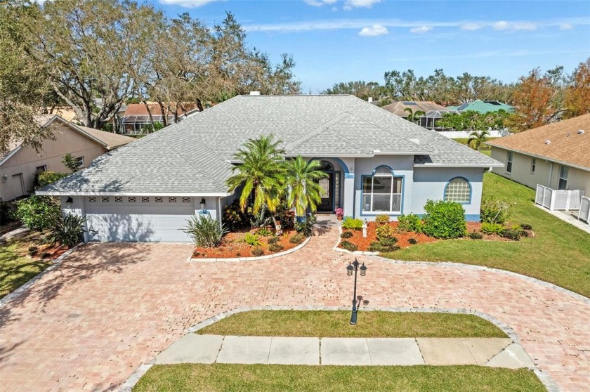 This breathtaking lakefront pool home in the highly sought-after - Beach Home for sale in Sarasota, Florida on Beachhouse.com