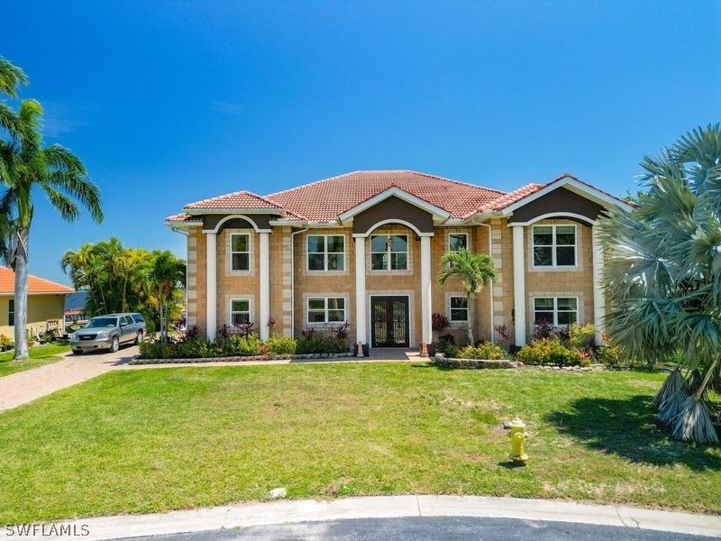 Welcome to this luxurious estate corner home boasting stunning - Beach Home for sale in North Fort Myers, Florida on Beachhouse.com