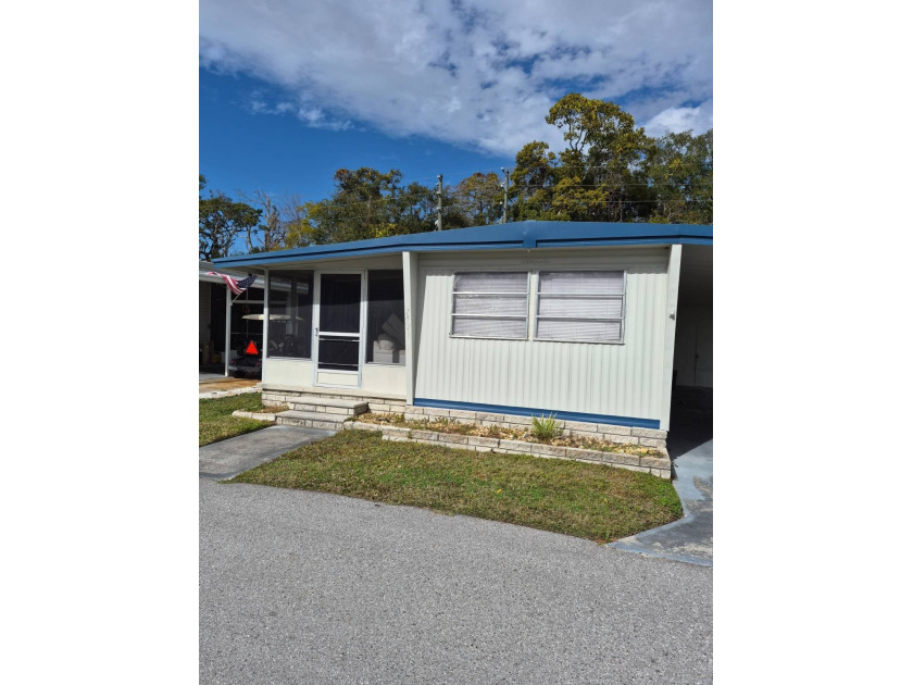 NICE SINGLE WIDE HOME LOCATED IN HACIENDA VILLAGE NEW PORT - Beach Home for sale in New Port Richey, Florida on Beachhouse.com