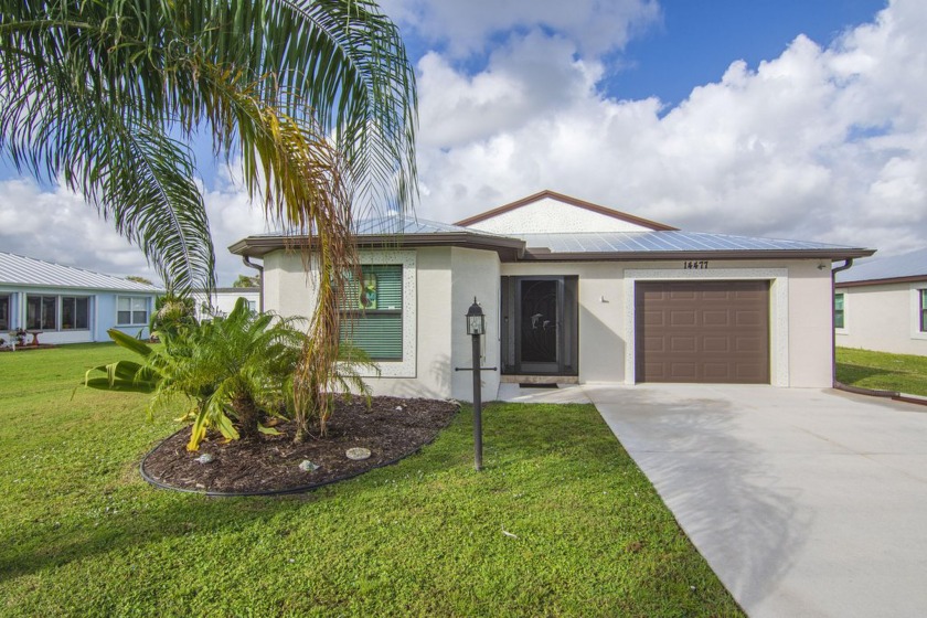 Stunning home built in 2021 in vibrant 55+ community.  Land - Beach Home for sale in Fort Pierce, Florida on Beachhouse.com