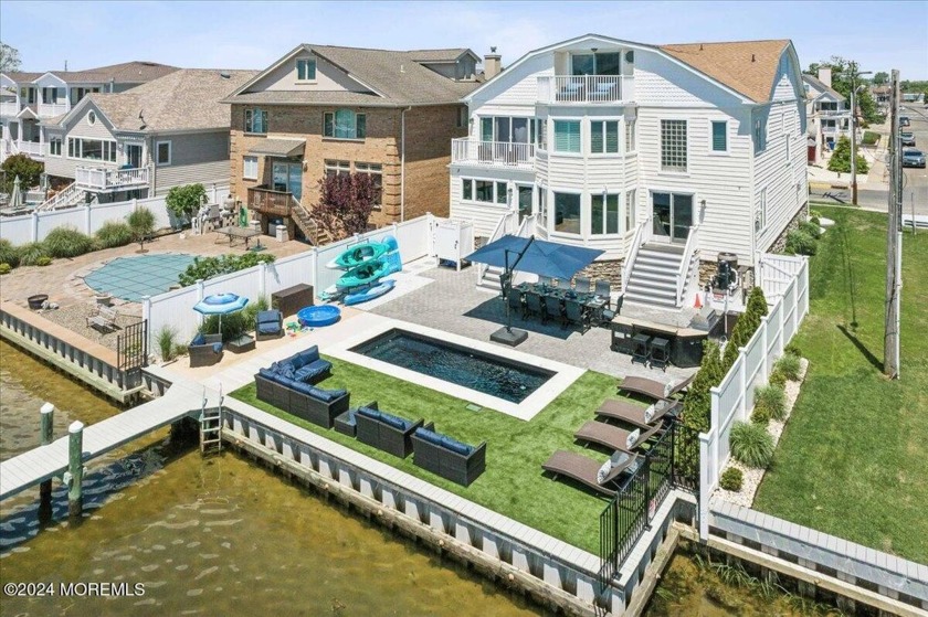 Discover unparalleled luxury living at this exquisite - Beach Home for sale in Point Pleasant Beach, New Jersey on Beachhouse.com