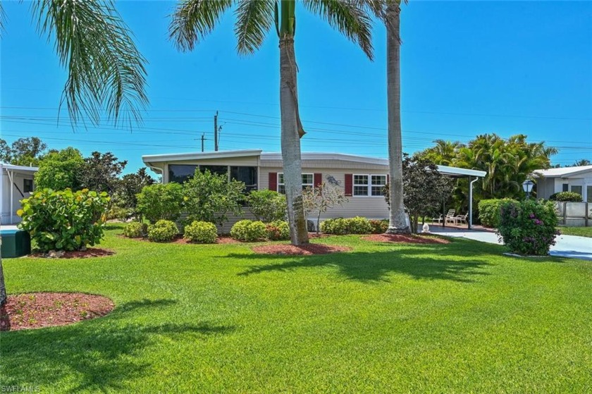 This spacious and well-maintained home includes a garage with - Beach Home for sale in Naples, Florida on Beachhouse.com
