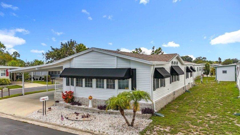 This Premium 2000 Jacobsen is in a quiet gated 55-plus community - Beach Home for sale in St. Petersburg, Florida on Beachhouse.com