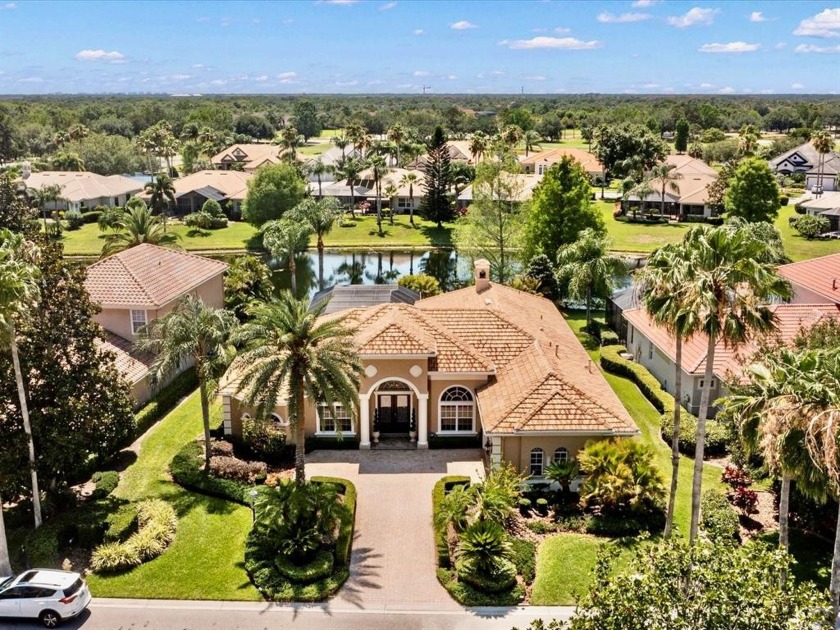 Elegant Mediterranean style home with water view in sought after - Beach Home for sale in Lakewood Ranch, Florida on Beachhouse.com