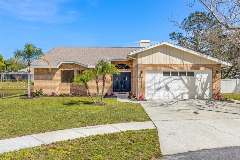 PRICE REDUCED TO SELL! Enjoy your Pool & Water Views in this - Beach Home for sale in Tarpon Springs, Florida on Beachhouse.com