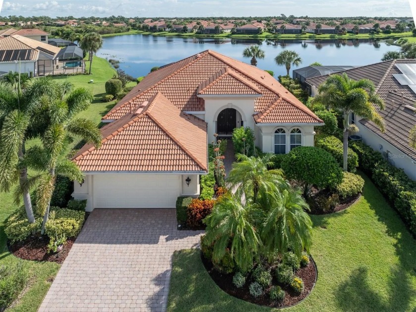 Experience luxury living in this stunning four-bedroom - Beach Home for sale in Venice, Florida on Beachhouse.com