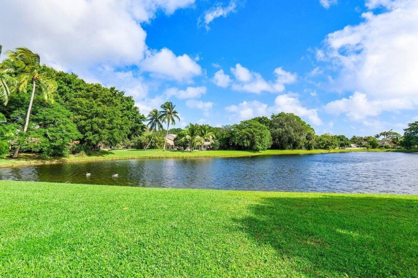 Spectacular Lakefront Property on a Prime Third-Acre Lot! - Beach Home for sale in Boca Raton, Florida on Beachhouse.com